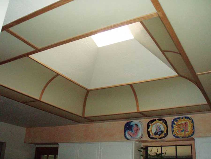 The kitchen skylight admits too much heat.